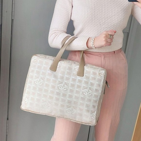 CHANEL Handbags - CHANEL Beige Nylon Travel Line Laptop Bag